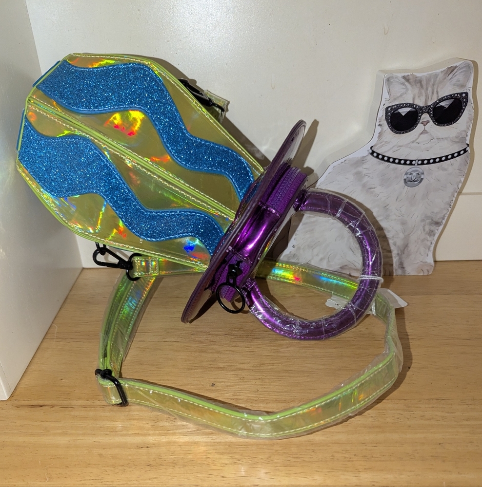 Iridescent Ring Pop Crossbody Bag by Dolls Kill with a bag of fresh Ring Pops!